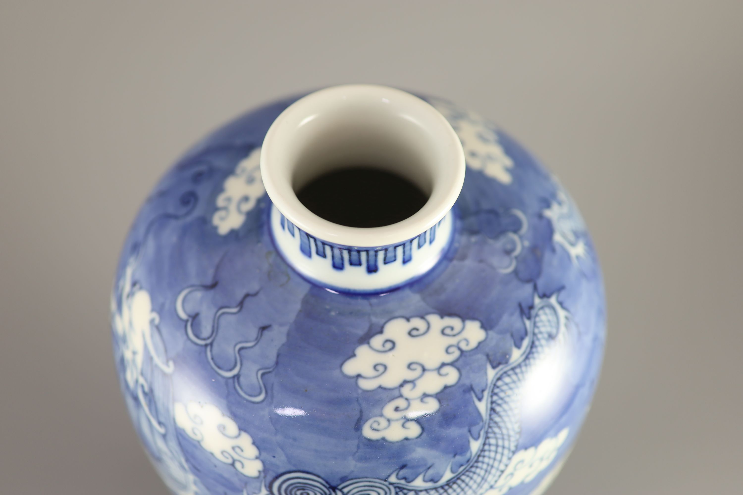 A Chinese blue and white 'dragon' meiping, Kangxi mark but 19th century, 33.5cm high